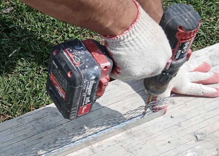 Drilling weep holes in casing bead (plaster stop).