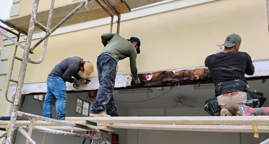 Stucco on a badly deteriorated brick chimney