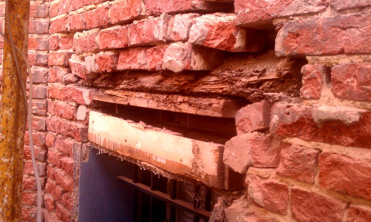 We tore the stucco off and repaired the wall.