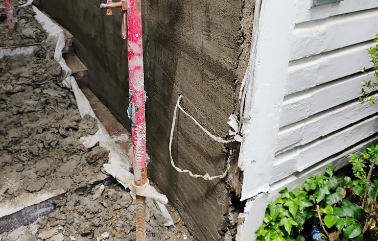 We packed the joints and scratched over the bricks with super mortar.