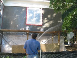 Wetting wall with a hose