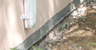 stucco is failing is due to a lack of coping.