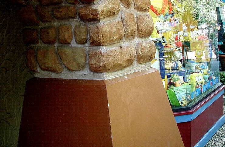 Base of stones is stucco,