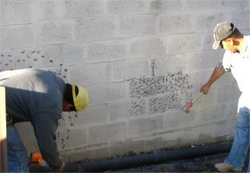 An electric chipping hammer or a hatchet.